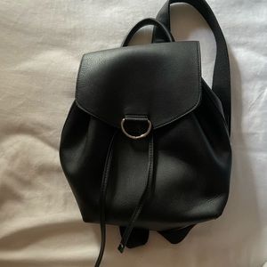 Black faux leather backpack
